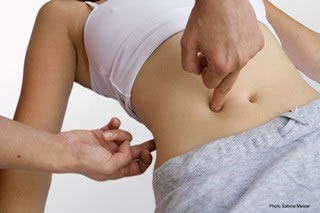 emmett2 Female torso with light pressure applied by therapist's fingers